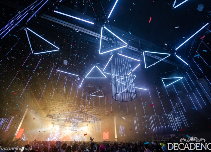 Decadence 2023: Stage production ft. floating LED lights and bright stage.