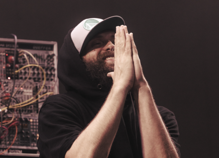 Pretty Lights return: Pretty Lights with his hands together at Mission Ballroom, on stage