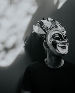 Boris Brejcha black and white press photo with his signature joker mask covering his face.