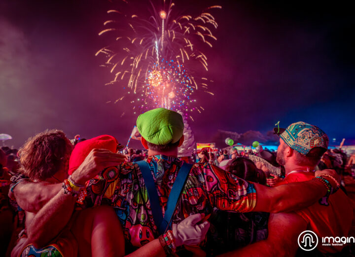 Imagine Music Festival 2023: 3 Friends watching fireworks over the crowd.