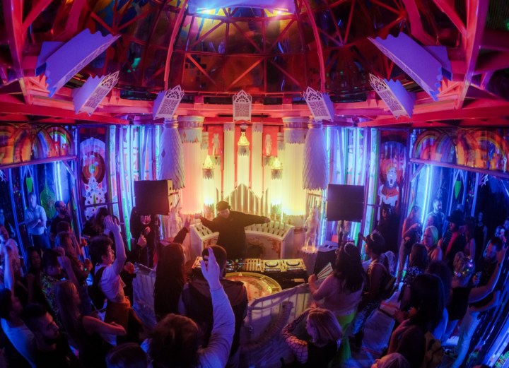 Photo of a DJ playing in a crystal palace