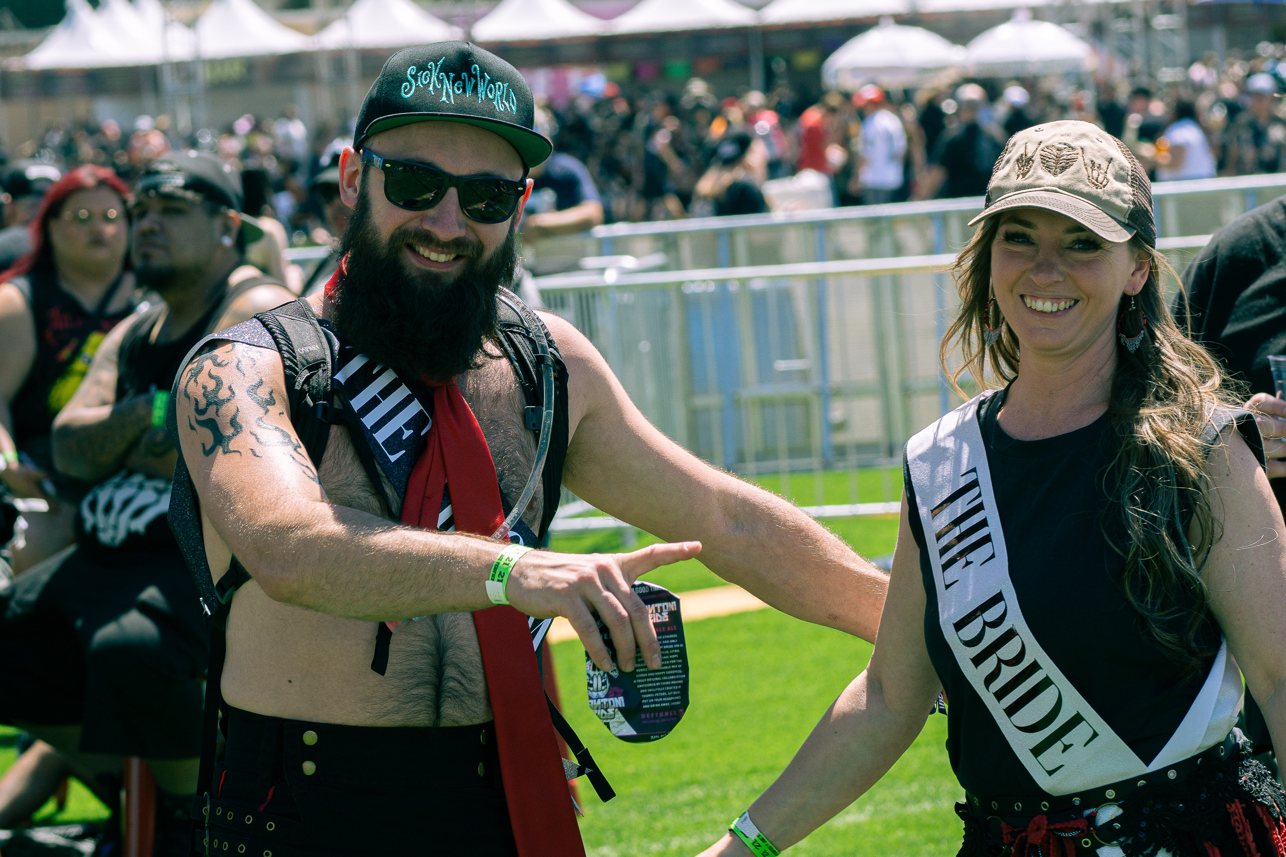 Newly married couple attend metal concert 