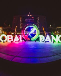 Global Dance light up LED sign in rainbow colors.