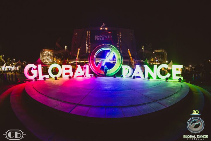 Global Dance light up LED sign in rainbow colors.