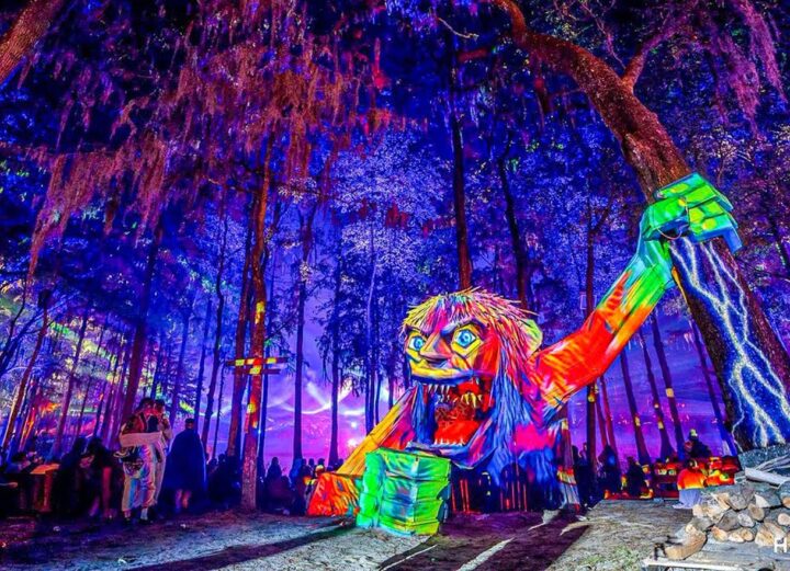 Wooden creature holding a tree at Suwannee's Hulaween