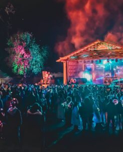 Sacred Acre music festival at night in Alaska.