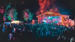 Sacred Acre music festival at night in Alaska.